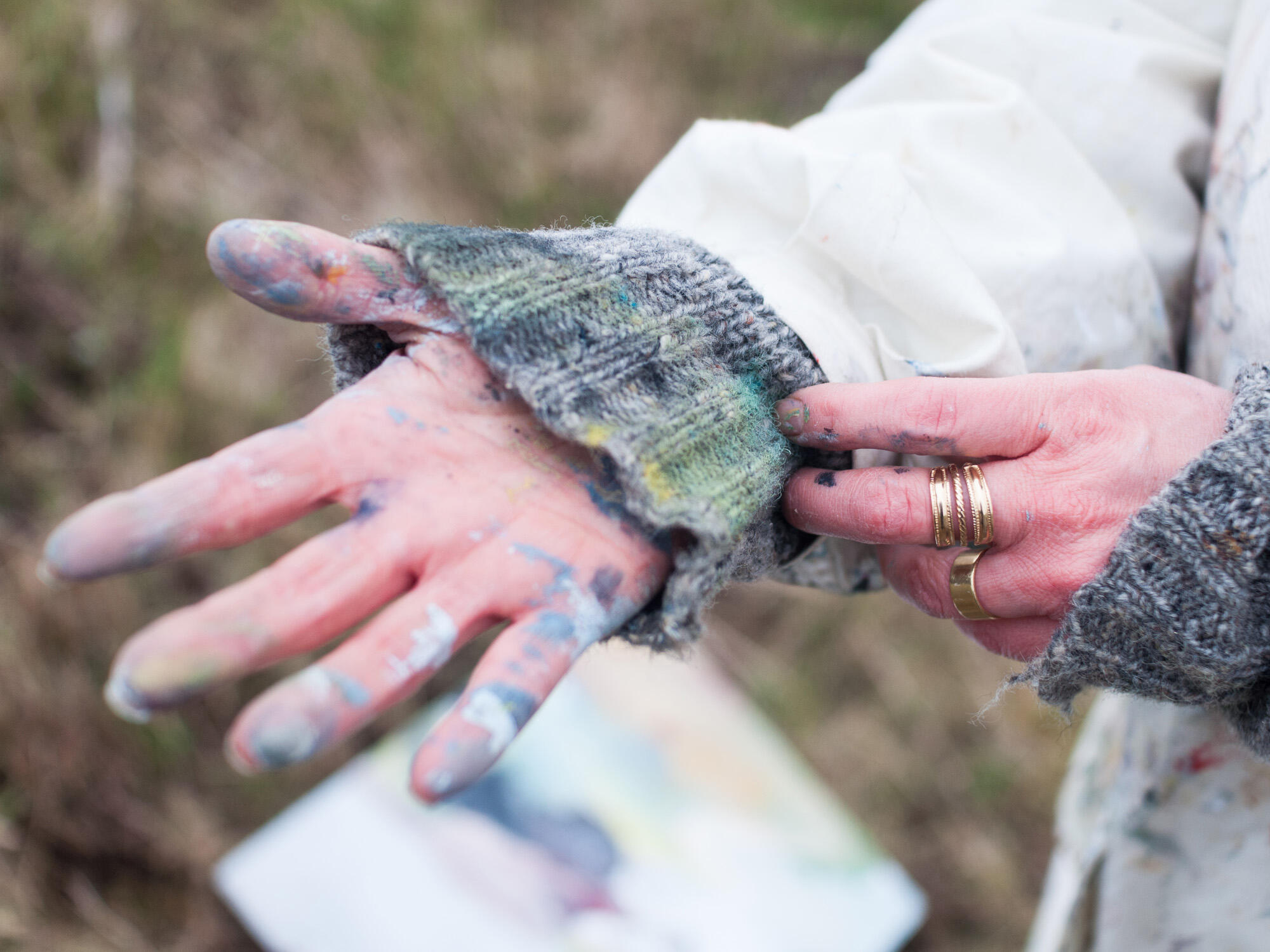 Brita Granström's hands with paint